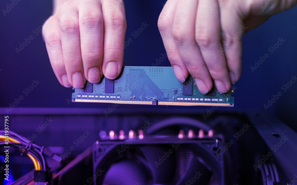 Fototapete installing a memory module in your computer. a simple module for a personal computer.
