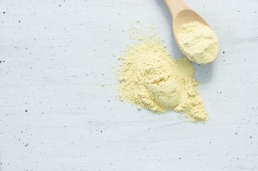 Ginger powder wooden spoon  isolated on white background with copy space