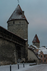Fototapeta premium Historic tower defense tower in Old Town in winter. Estonia