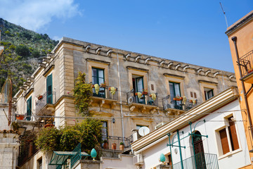 Beautiful old buildings, streets, stairs and alley ways in the town of Taormina, Cantania, Sicily,...