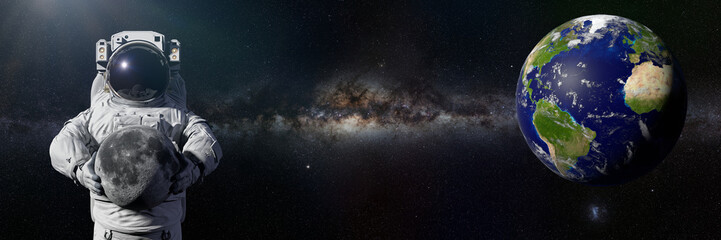 astronaut holding the Moon