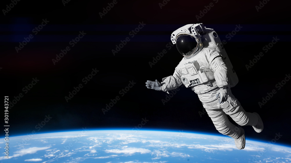 Canvas Prints astronaut performing a spacewalk in outer space