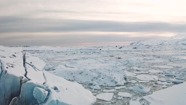 Aerial view of the J kuls rl n glacial lagoon and floating icebergs. The beginning of spring in Iceland