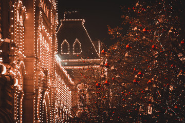 building in the night and christmas decoration