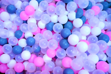 Background of colorful plastic balls. Top view