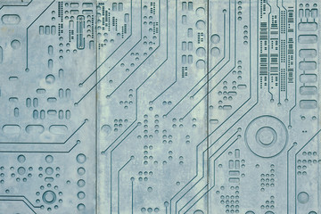 Concrete wall texture with carved pattern of digital electronic computer board