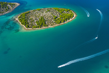 Beautiful Mediterranean stone islands on Croatian coast, Murter archipelago coastline, aerial view of turquoise bays and yachts from drone
