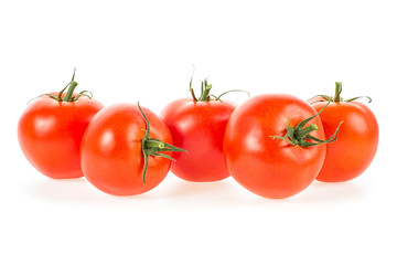 Ripe red tomatoes isolated on white background