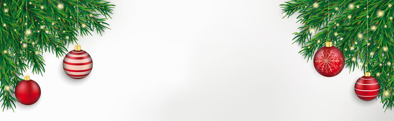 Weihnachtskarten Banner mit grünen Tannenzweige und roten Christbaumkugeln