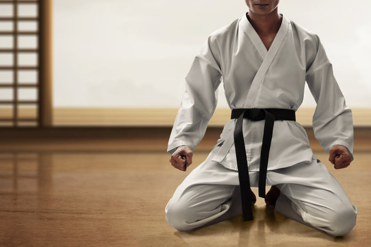 Karate martial arts fighter sitting