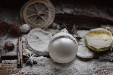 Christmas still life Christmas decorations balloon orange clock snow and powdered sugar