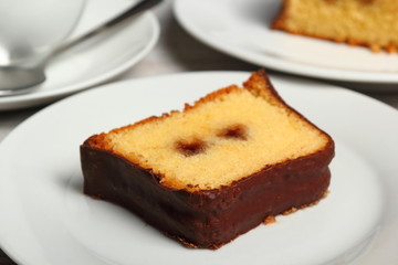 Chocolate glazed loaf cake with strawberry jam