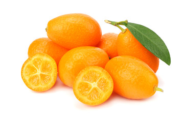 Cumquat or kumquat with slices and leaves isolated on white background