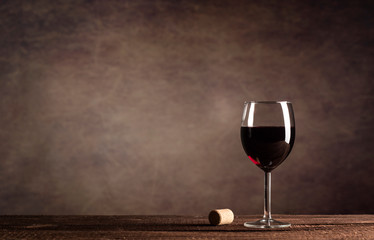 Red Wine in glass on a dark background with copy space