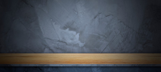 Empty top wooden shelves with grunge cement  wall texture background ,loft style.Counter for display or montage of product.