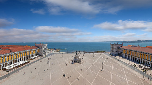 Lisbon, Portugal. Aerial view of Praca do Comercio aka Terreiro do Paco or Commerce Square with King Dom Jose statue, Cais das Colunas Wharf and Tagus or Tejo River estuary