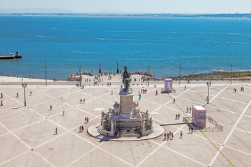 Lisbon, Portugal - October 20, 2019: Aerial view of Praca do Comercio aka Terreiro do Paco or Commerce Square with King Dom Jose statue, Cais das Colunas Wharf and Tagus or Tejo River estuary