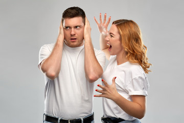 Fototapeta premium relationship difficulties, conflict and emotions concept - unhappy couple having argument