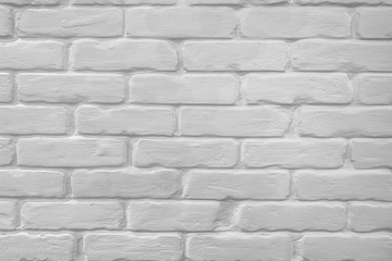 vintage background of plastered brick wall close up