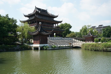 Fototapeta premium Suzhou,China-September 17, 2019: A pond and a garden in Nan Men, Suzhou, China