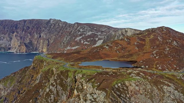Aerial of Slieve League Cliffs are among the highest sea cliffs in Europe rising 1972 feet or 601 meters above the Atlantic Ocean - County Donegal, Ireland