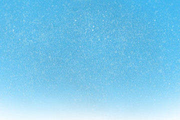 Fototapeta na wymiar snow on blue background