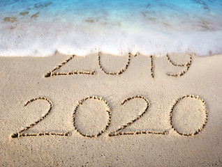 New Year 2020 is coming concept on tropical beach.