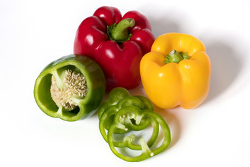 Fresh red green yellow Bell Pepper Slices on white background