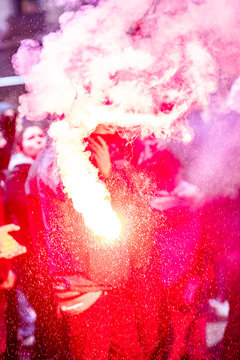 Protesters with a red torch and smoke - 7/12