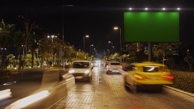 Mock Up Concept - Green Screen Billboard The Road With Traffic At Evening Time. Timelapse