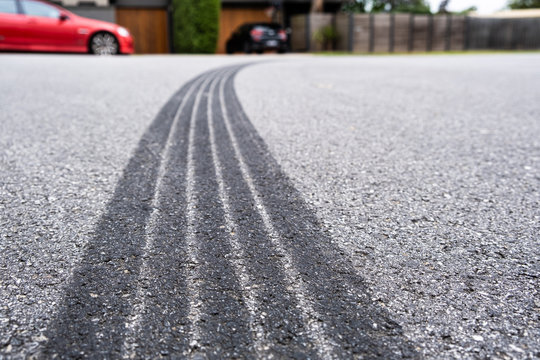Tire track mark on asphalt made by hard vehicle braking