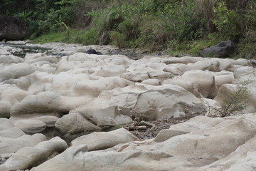 river with a stretch of white stone