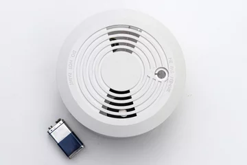 Fotobehang Disabled Smoke Detector. Wireless photoelectric smoke detector © Alex 