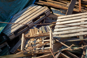 Discarded wooden pallets in stack
