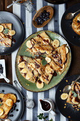 crepes with banana, chocolate-nut sauce and sweet croutons