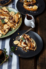 crepes with banana, chocolate-nut sauce and sweet croutons