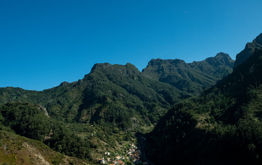 Fototapeta na wymiar Mountains near Levada Do Risco, PR6, from Rabacal Madeira, Portugal, Europe