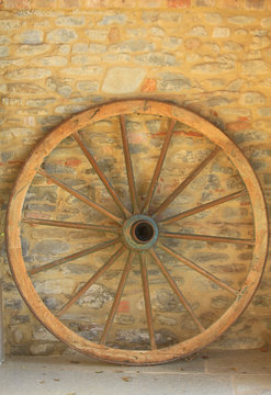 big wooden wheel on the wall