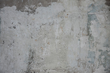 Horizontal plaster grunge wall background. Overlay grainy texture for your design. Brown grunge stucco with scuffs