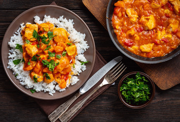 Chicken goulash served with boiled rice.