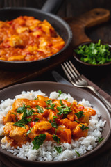 Chicken goulash served with boiled rice.