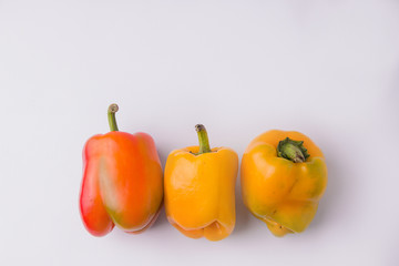 Ugly peppers on a white background.