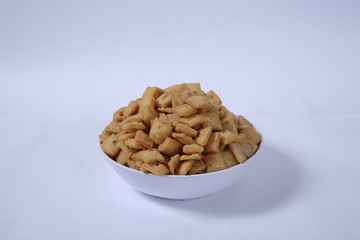 Shakkar pare Also Know as Shakkarpare, Shakarpare, Shakarpali, Shakkar Para, Sakarpara or Shankarpalli or shankar pale is a Snack Typically Made in India During Diwali - Image