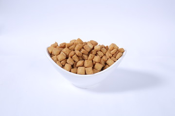 Shakkar pare Also Know as Shakkarpare, Shakarpare, Shakarpali, Shakkar Para, Sakarpara or Shankarpalli or shankar pale is a Snack Typically Made in India During Diwali - Image