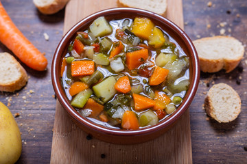 Mixed vegetable soup with bread. Minestrone, winter food, detox food