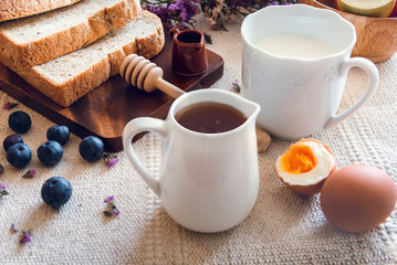 Breakfast Nature Vegan Vegetarian Food With Milk, Honey, Bread and Natural Fresh Fruit on a Table. Natural Keto Diet Eating for Healthy Nutrients Concept., Beverage and Homemade Nutrition Food.