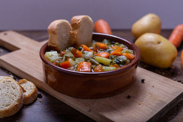 Mixed vegetable soup with bread. Winter food, detox food, minestrone soup