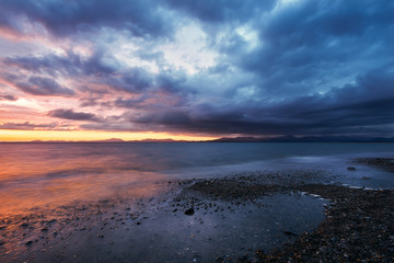 Obraz premium Sunset at Shell Island in Wales colorful vibrant moody scene