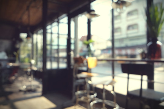Blur coffee shop - cafe blurred with bokeh background, vintage style