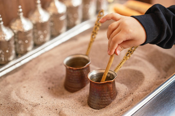 Traditional turkish coffee brewed in sand for getting the finest aroma